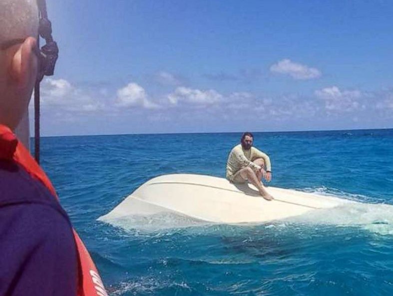 coast guard rescue man on boat 1